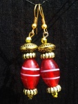 Red and white striped glass bead with golden beads and findings