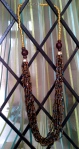 Gold, brown, blue and red beaded multistrand necklace