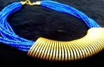 Blue bead strands with golden metal wrapped centre