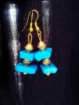 Turquoise wooden block beads with golden beads and findings